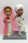 Custom Indian bobblehead wedding cake topper