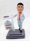 Realtor themed bobbleheads